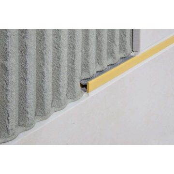   Schlüter DILEX-EZ 9 arany. Feszültségmentesítő- és díszítő profil dekoratív fugák kialakításához